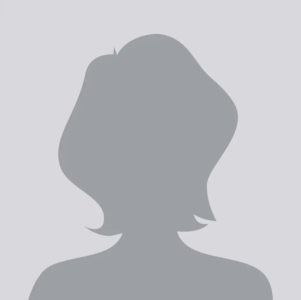 A silhouette of a woman on a gray background.